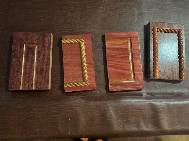 Four small mahogany finish samples showing different stain tones and moulding treatments